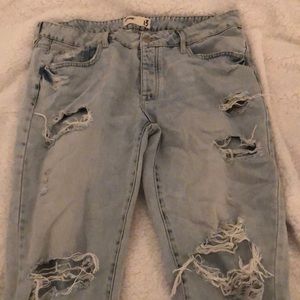 light wash ripped boyfriend jeans